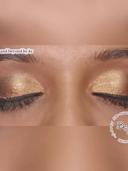 A classic golden brown smokey eye. This look is a winner for any festive occasion, pairing beautifully with traditional Indian outfits. The blend of gold shimmer and warm brown tones is timeless.