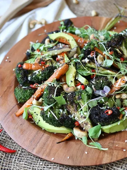 My grilled broccoli, carrot, and avocado salad is a customer favourite. It's a gluten-free and vegan bowl of goodness, tossed in a light sesame dressing and packed with vitamins and healthy fats to keep you energized.