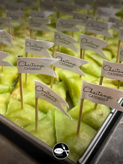 My signature Paan Petha combines the sweetness of Agra's famous petha with the aromatic, refreshing flavor of paan. Each piece is served with our custom flag for a special touch.