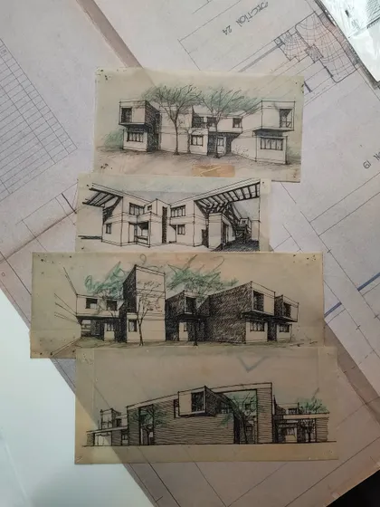 A collection of early hand-drawn elevation studies from past projects.