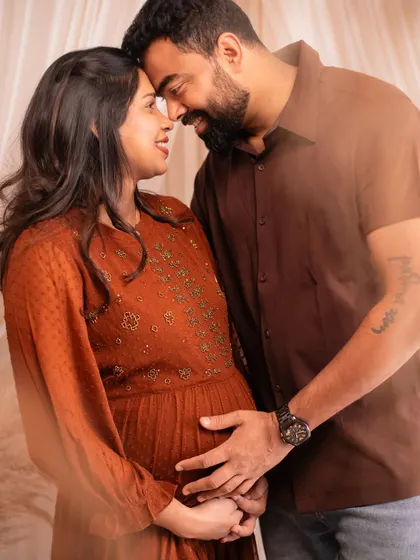 A beautiful and intimate portrait that captures the deep love and anticipation of the parents-to-be.