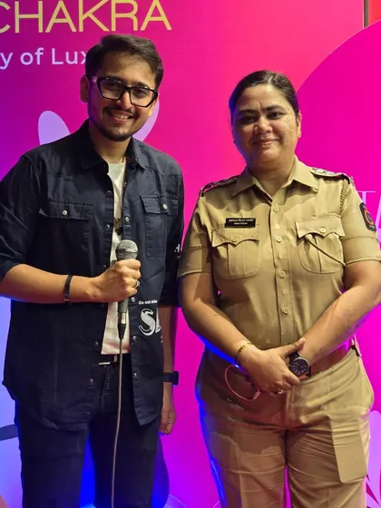 Posing with a police officer who was part of the security at a Valentine's week event. I'm grateful for the support of local authorities who help ensure my events run smoothly.