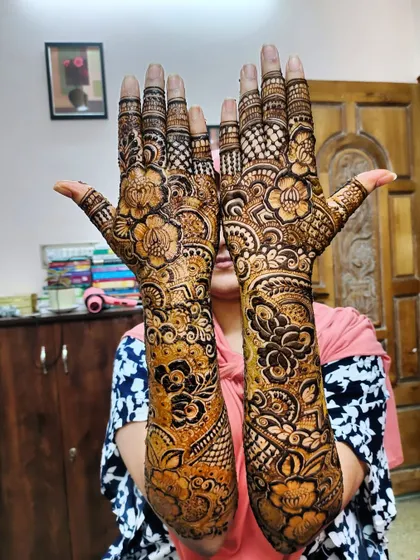 A full view of an intricate bridal design, showcasing the level of detail and coverage I provide for my brides.