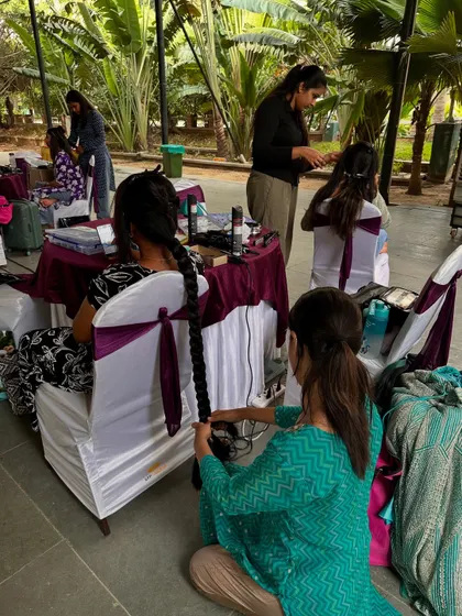 An outdoor portfolio session in progress. Students get to practice in a real-world setting.