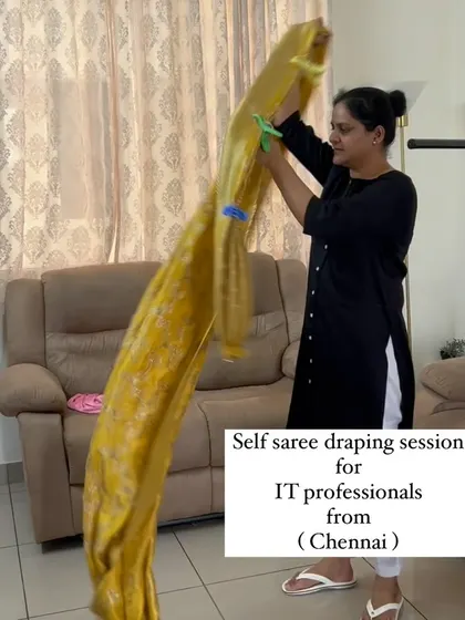 An IT professional from Chennai learning to drape a beautiful yellow saree online. I make sure my students can practice on their own sarees during the class.