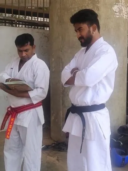 As a SoShihan, I personally oversee the grading, seen here with one of my senior instructors. We ensure every student is evaluated fairly on their technique and spirit.