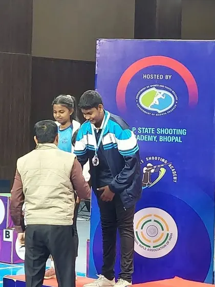 Jonathan receiving his silver medal on the podium at the 66th NSCC.
