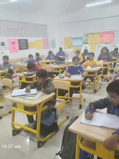 A full classroom view of Grade 2 students engrossed in their work. Our interactive approach fosters curiosity and a love for learning.