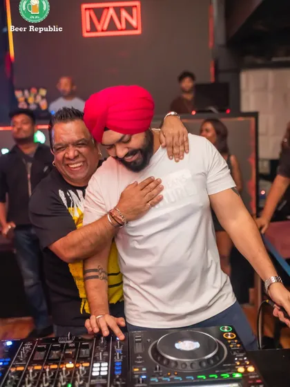 A warm embrace with my brother in music. The love and respect is mutual.