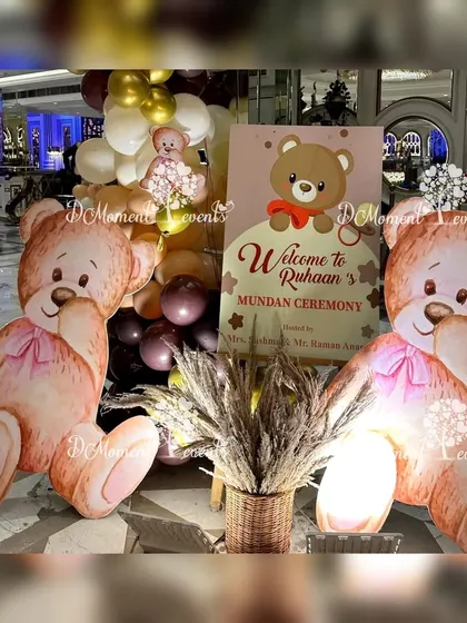 Two large, welcoming teddy bear props stand at the entrance of the Mundan ceremony, creating a sweet and memorable first impression.