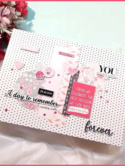 The cover of a large A4 scrapbook for a 25th wedding anniversary.