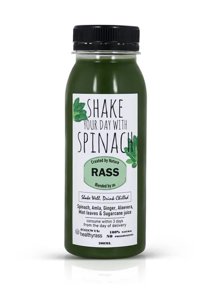 A clean product shot of a green juice bottle on a white background, perfect for a healthy food delivery menu or online store.