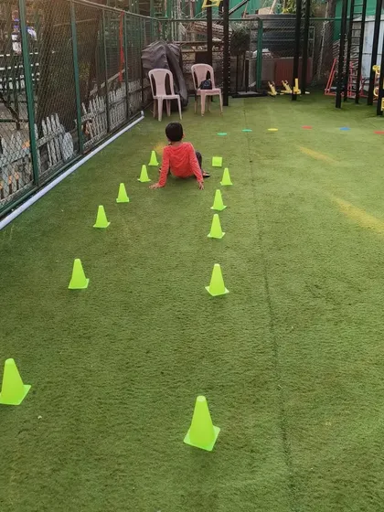 This cone maze is a great solo challenge. It encourages a child to focus and plan their path, building cognitive skills like problem-solving while they move their body.