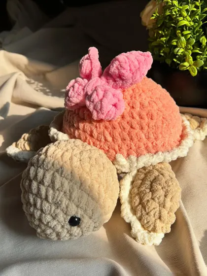 A final look at our beautiful butterfly-themed turtle. The combination of soft colors and textures makes it a truly special handmade gift.