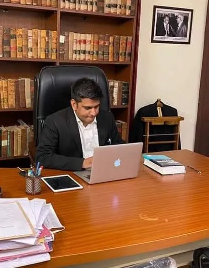 At my desk in our new Defence Colony office in Delhi, marking a new beginning for our growing practice.