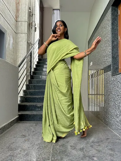Feeling radiant in this light green saree. I love experimenting with different colors and styles.