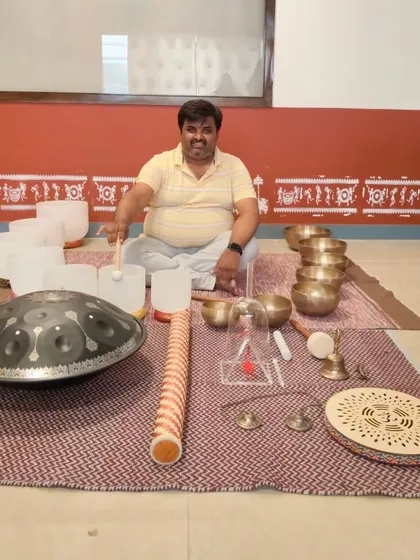 A student from our March batch, surrounded by a beautiful array of sound healing instruments. Each graduate leaves with the skills to create their own unique sessions.