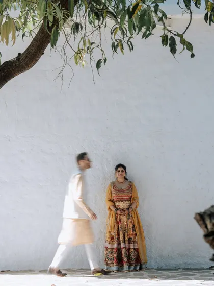 A collection of portraits from a beautiful Haldi photoshoot. I coordinate with the photo team to capture a variety of shots, from romantic close-ups and playful kisses to stylish individual portraits, all within a cohesive, sun-drenched theme.