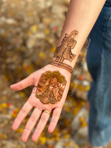 Another angle of the bride and groom portrait mehendi. The outdoor setting highlights the natural beauty of the henna.