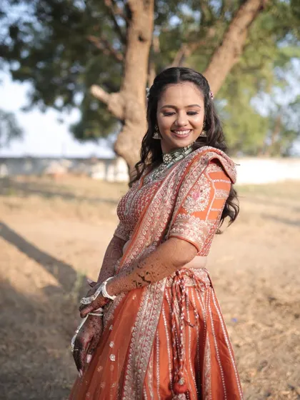 The complete look, from the floral hair accessories to the intricate lehenga. Every detail was planned to create this stunning engagement style.