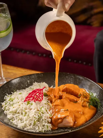 Dive into coastal indulgence with our Malvani Salmon Curry. The richness of Malvani spices meets the elegance of tender salmon in a symphony of flavors from the shores of India.