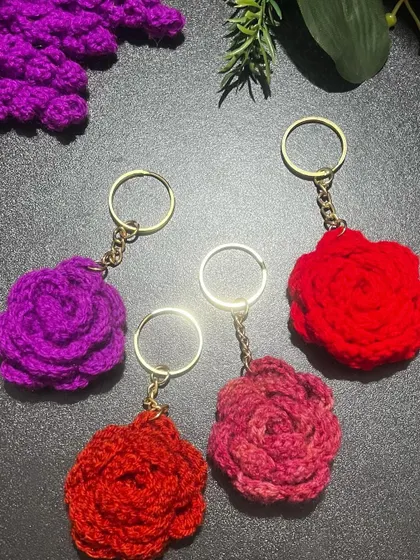 A close-up of my rose keychains, showing the detailed petal work.