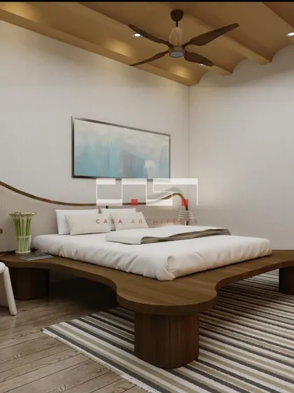 A unique bedroom concept with a custom-designed wooden bed that has a flowing, organic form and a warm, natural aesthetic.