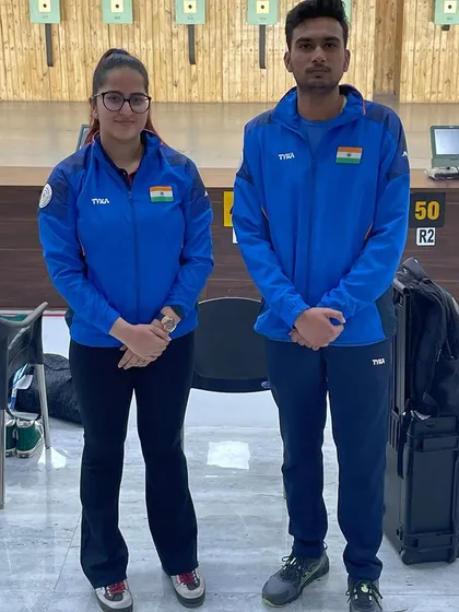 Rhythm Sangwan and Varun Tomar of India with their silver medal in the 10m Air Pistol Mixed Team event at the ISSF World Cup.