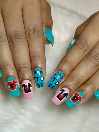 The full view of the custom "Mom-to-be" nail art, a perfect example of how we can create designs for any special moment.
