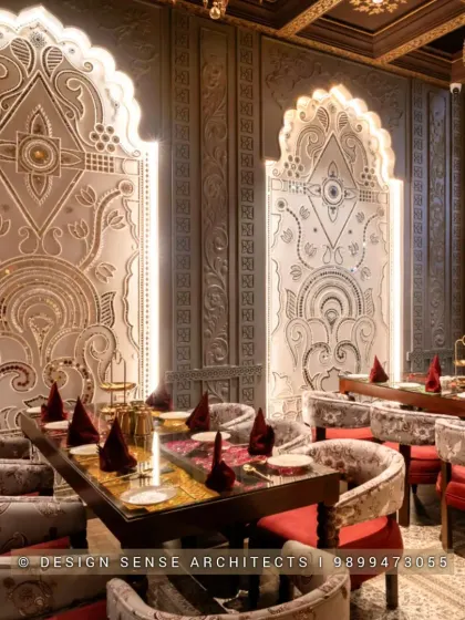 The magic is in the details. This dining section features custom-designed, backlit panels with intricate carvings, creating an intimate and opulent atmosphere for guests. It's about making every corner of the restaurant feel special.