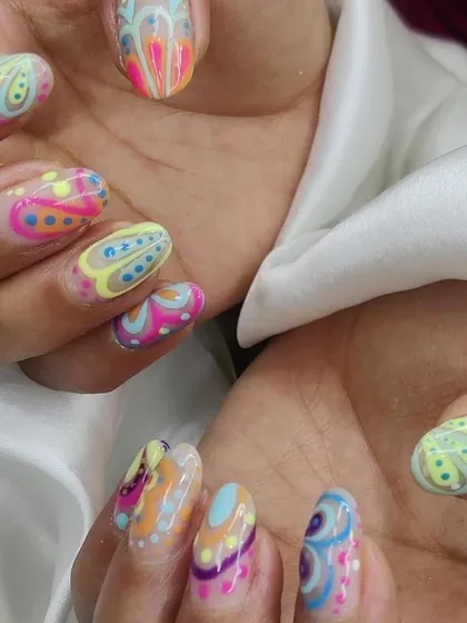 This view shows how the intricate patterns look across all the nails, creating a cohesive and stunning set of wearable art.