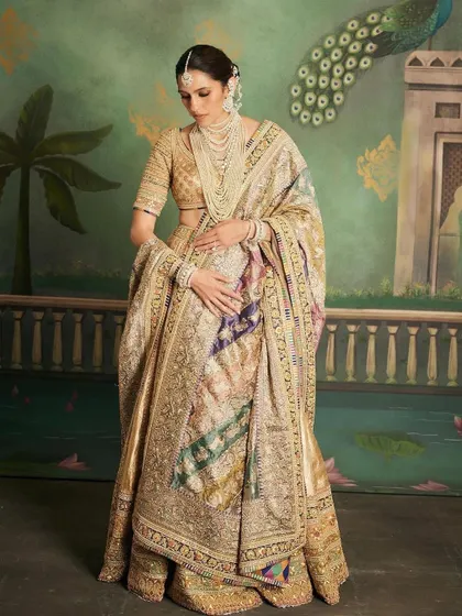 Another portrait from the 'Hastakshar' ceremony, showing the full scope of the magnificent Abu Jani Sandeep Khosla lehenga. It's a look that is both traditional and absolutely timeless.
