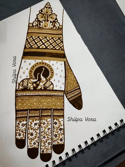 A design sketch on paper, featuring a traditional elephant motif. This is how I plan my intricate compositions.