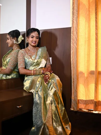 My lovely client Thanu getting ready for her ring ceremony. I created a soft, elegant look to match her beautiful pastel green silk saree.