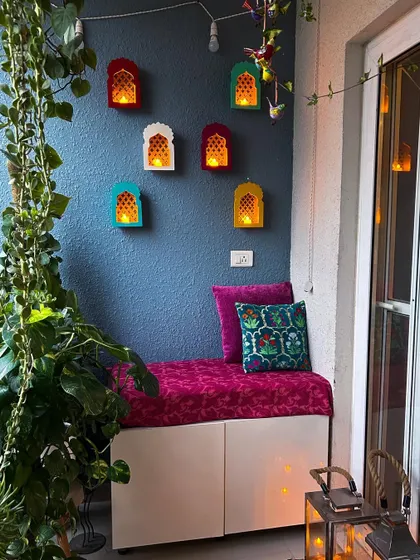 Another look for the balcony, this time with jharokha-style lamps for a festive, traditional feel.