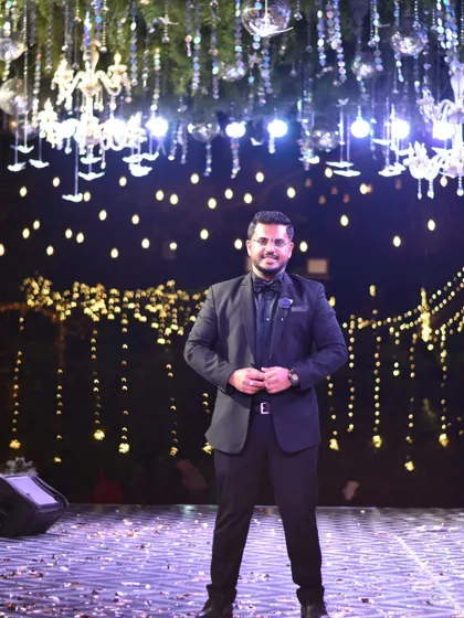 Suited up and ready for a glamorous Sangeet night under the stars.