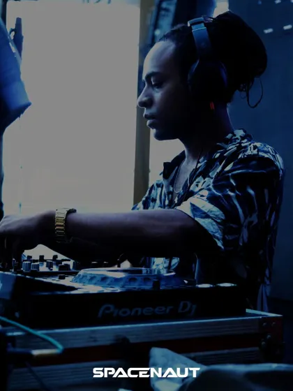 Deep in the mix during my set at the Spacenaut festival. I focus on track selection and blending to take the audience on a musical journey.