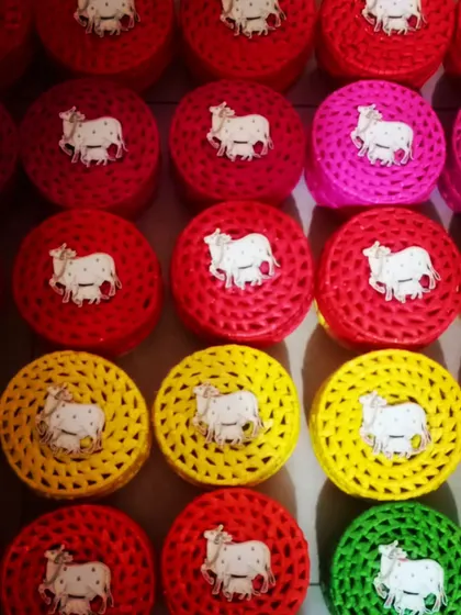 The Pichwai cow is our classic bestseller for weddings and new beginnings. These colorful river grass boxes are a vibrant and auspicious choice for your hamper boxes.