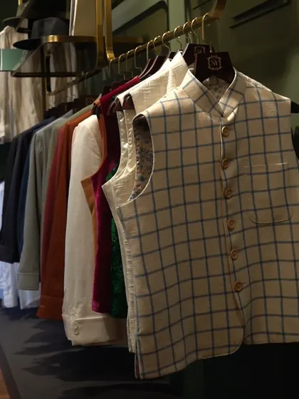 Style that adapts to your every move. A collection of our Nehru vests in various fabrics and patterns, from classic checks to solid velvets, hangs ready for any occasion.