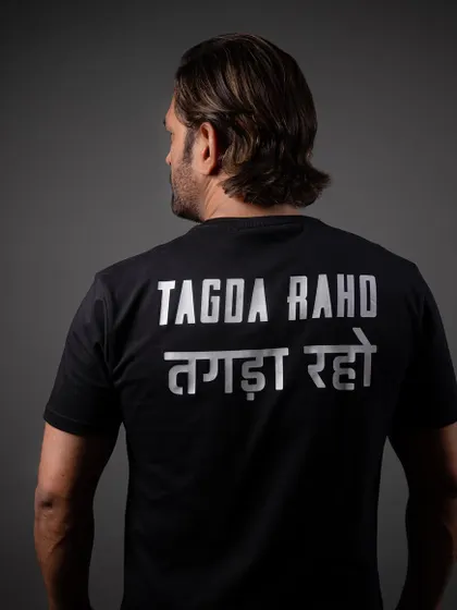 A powerful image of MS Dhoni wearing our 'Tagda Raho' t-shirt. His investment and belief in our brand is a testament to our mission of reinventing 'India Ka Apna Workout'.