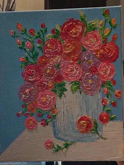 A close-up of a beautiful and richly textured floral bouquet painting, created with palette knives.