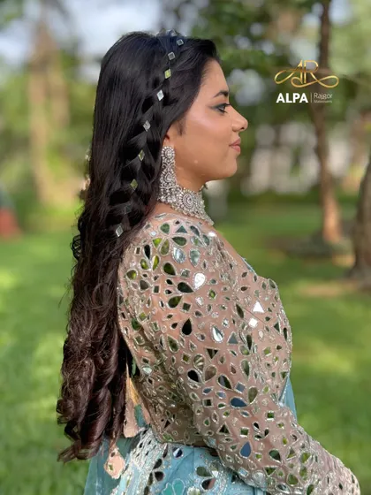 The back of the hairstyle, showing the full length of the intricate braid.