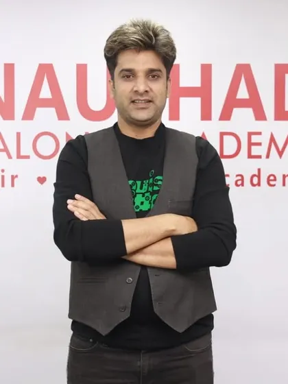 This is me at my academy. My goal is to provide a space where anyone with a passion for hair can come and learn the skills to build a successful career.