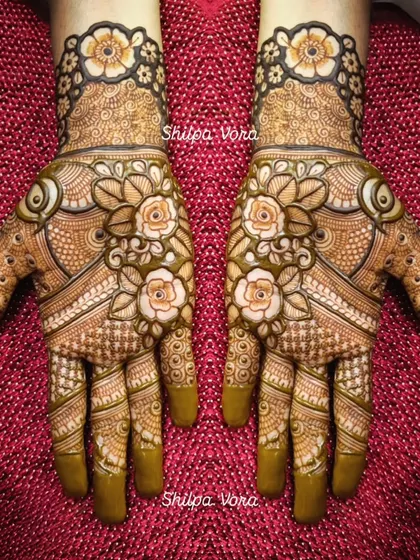 A symmetrical design with shaded roses, perfect for an engagement or sangeet ceremony.