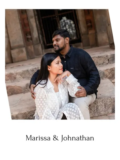 A posed portrait of the couple on the steps of a monument, exuding a calm and elegant vibe.