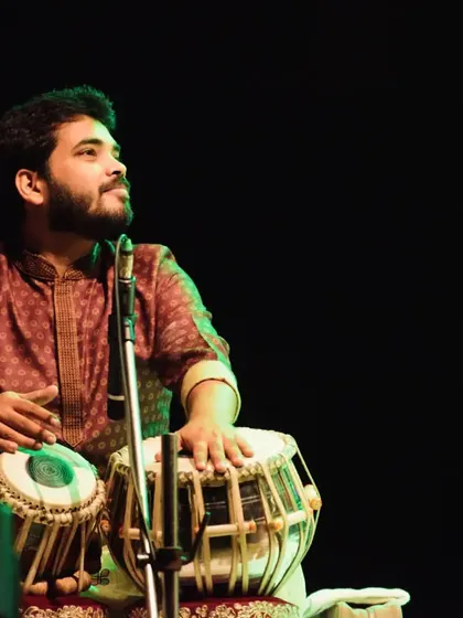 Looking upwards during the 'Shefali' concert, lost in the music.