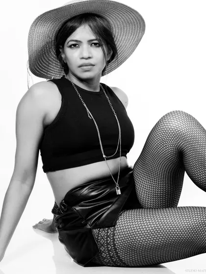 A black and white version of a seated pose, for a classic and timeless portrait.