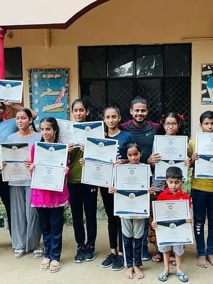 My champions holding their participation certificates from the International Book of Records. Their effort and dedication make me proud.