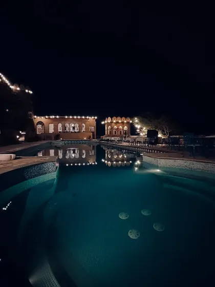 The serene pool at our heritage hotel in Rajasthan, a perfect spot for an evening swim to relax and recover.