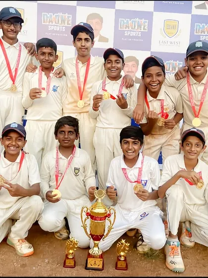 Our team celebrating their victory at the CN Ravikiran Memorial Cup, posing with the championship trophy and medals.